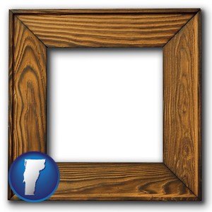 a wooden picture frame - with Vermont icon