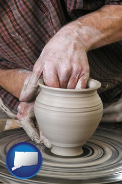 a potter making pottery on a pottery wheel - with Connecticut icon