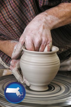 a potter making pottery on a pottery wheel - with Massachusetts icon