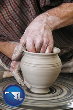 a potter making pottery on a pottery wheel - with Maryland icon