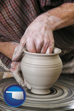 a potter making pottery on a pottery wheel - with Oklahoma icon