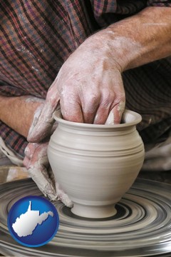 a potter making pottery on a pottery wheel - with West Virginia icon