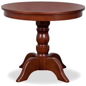a traditional round table made from cherry wood