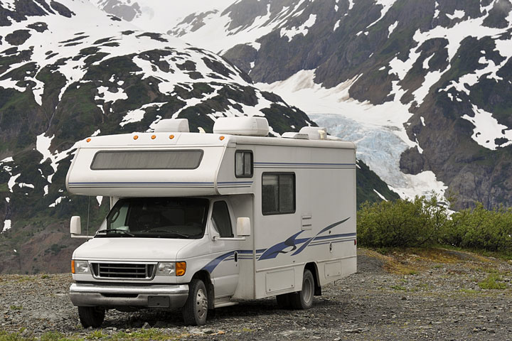 camper parked near mountains in Alaska