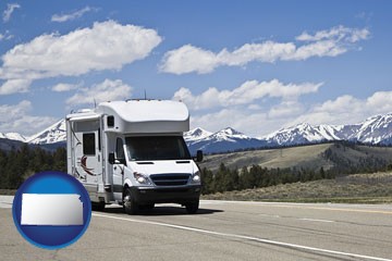 recreational vehicle and snow-capped mountains - with Kansas icon