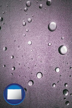 water droplets on a shower door - with Colorado icon