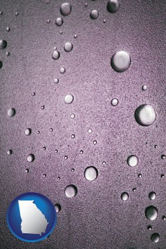 water droplets on a shower door - with Georgia icon