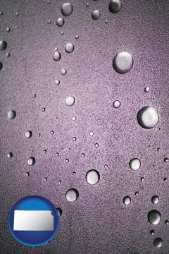 water droplets on a shower door - with Kansas icon