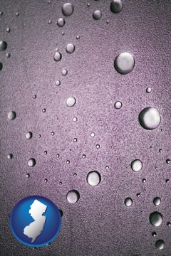 water droplets on a shower door - with New Jersey icon