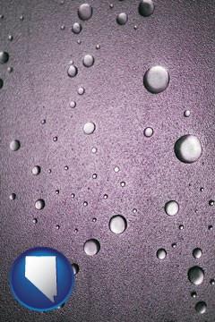 water droplets on a shower door - with Nevada icon