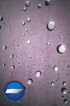 water droplets on a shower door - with Tennessee icon