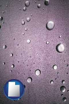 water droplets on a shower door - with Utah icon
