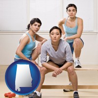 alabama map icon and three athletes wearing sportswear