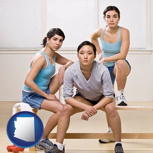 three athletes wearing sportswear - with Arizona icon
