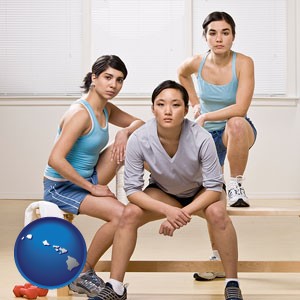three athletes wearing sportswear - with Hawaii icon