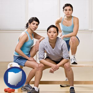 three athletes wearing sportswear - with Ohio icon