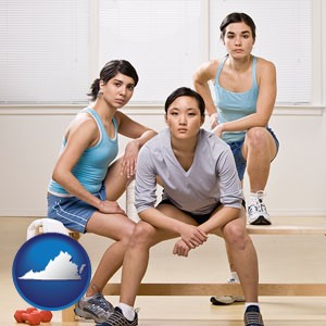 three athletes wearing sportswear - with Virginia icon