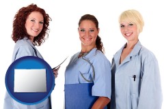 colorado three female doctors wearing hospital uniforms