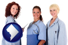 washington-dc three female doctors wearing hospital uniforms