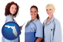 florida three female doctors wearing hospital uniforms