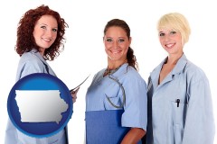 iowa three female doctors wearing hospital uniforms