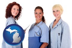 michigan three female doctors wearing hospital uniforms