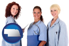 nebraska three female doctors wearing hospital uniforms
