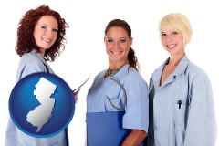 new-jersey three female doctors wearing hospital uniforms