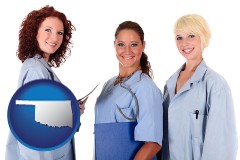 oklahoma three female doctors wearing hospital uniforms