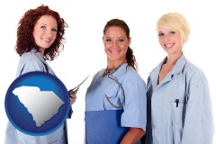 south-carolina three female doctors wearing hospital uniforms