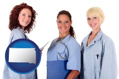 south-dakota three female doctors wearing hospital uniforms
