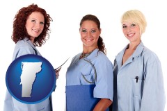 vermont three female doctors wearing hospital uniforms