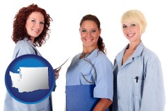 washington three female doctors wearing hospital uniforms