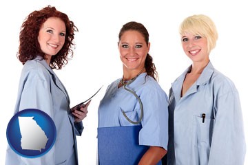 three female doctors wearing hospital uniforms - with Georgia icon