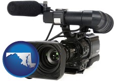maryland map icon and a professional-grade video camera