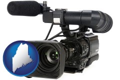 maine map icon and a professional-grade video camera
