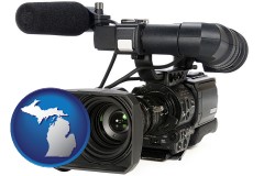 michigan map icon and a professional-grade video camera