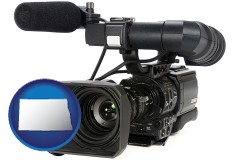 north-dakota map icon and a professional-grade video camera