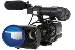 oklahoma map icon and a professional-grade video camera