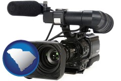 south-carolina map icon and a professional-grade video camera