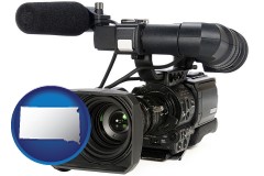 south-dakota map icon and a professional-grade video camera