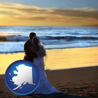 alaska map icon and a beach wedding at sunset