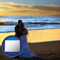 wyoming map icon and a beach wedding at sunset