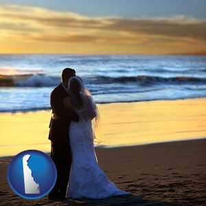a beach wedding at sunset - with Delaware icon
