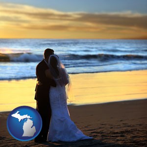 a beach wedding at sunset - with Michigan icon