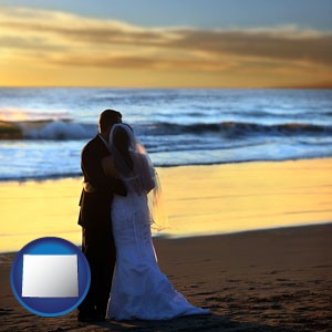 a beach wedding at sunset - with Wyoming icon
