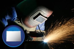 co map icon and a welder using welding equipment