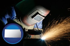 kansas map icon and a welder using welding equipment