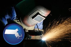 massachusetts map icon and a welder using welding equipment