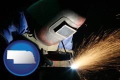 ne map icon and a welder using welding equipment